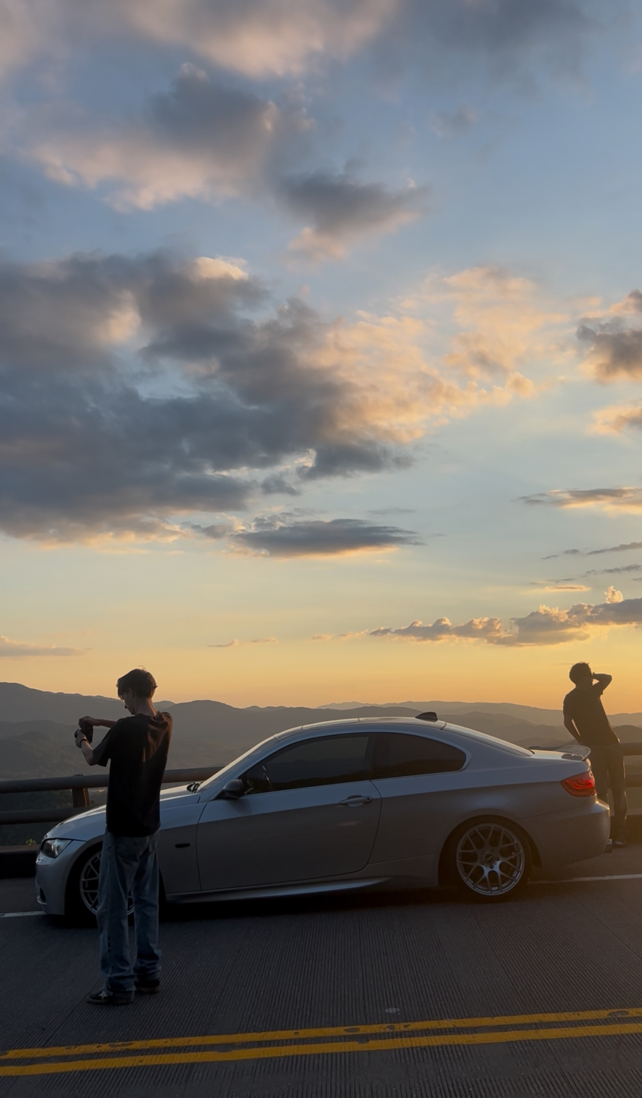 BMWs overlooking the mountains